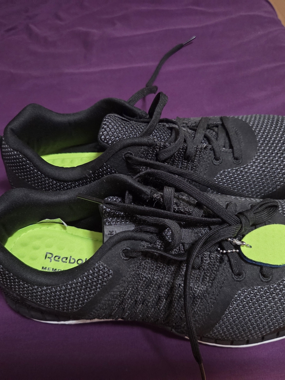 Safety shoes Reebok Men's Black Knit Sneakers with Bright Green Insoles.